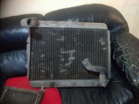 radiador de agua 3 filas $ 800 y de calefaccion $ 350