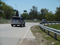 llegando al predio, luego de los 12km, una segunda rotonda, siempre a la derecha, 50 metros, la bajada de entrada....