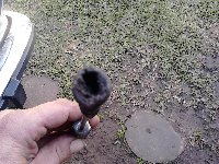 pedazo de manguera tapado.