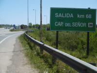 por ruta 8 llegar al kilómetro 68, bajar a la derecha ruta 39